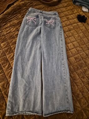 Edikted Wide Leg Light Wash Jeans with Pink Bow Back Detail Xs